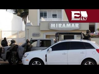 Turistas se fotografían en edificio donde fue capturado 'El Chapo'/Cae 'El Chapo' 22 febrero 2014