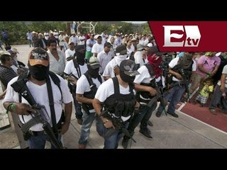 Desarme de autodefensas en Michoacán genera confusión / Opiniones encontradas