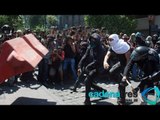Encapuchados marchan por calles del Centro Histórico y agreden a policías