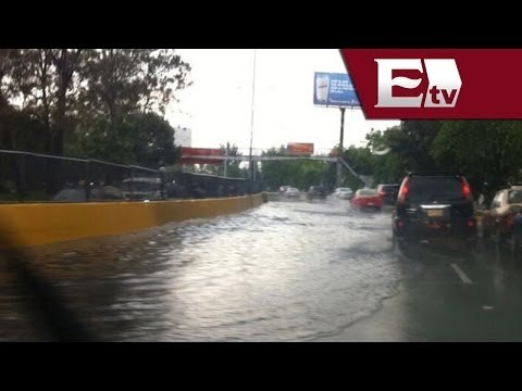 Lluvia deja 25 encharcamientos en nueve delegaciones en México / Andrea Newman
