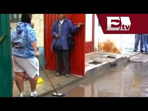 Baja nivel de agua en Chalco e Ixtapaluca y residentes inician labores de limpieza/ Pascal