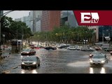 Fuertes lluvias dejan encharcamientos y caos vial en Paseo de la Reforma / Vianey Esquinca