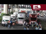 Transportistas bloquean Periférico Norte en protesta por el Hoy no circula