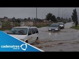 Lluvias causan inundaciones en carreteras, puentes y viviendas de Chihuahua