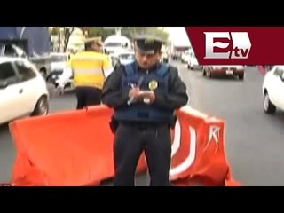 Taxi cae a socavón en La Merced / Vianey Esquinca