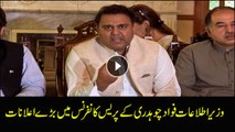 Information Minister Fawad Chaudhry talks to media