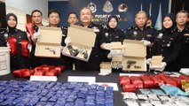 Drugs worth RM1.5mil, three pistols seized from married couple