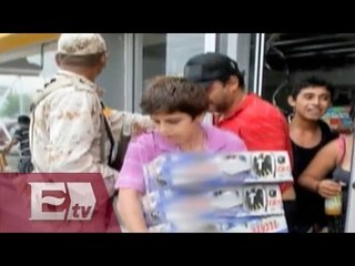 Reportan saqueos tras paso de Odile en Baja California Sur  / Andrea Newman