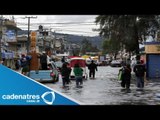 Lluvias en el Distrito Federal causan inundaciones en Chimalhuacan y Los Reyes la Paz