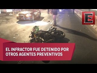 Motociclista arrolla a policías para evadir alcoholímetro en Ermita