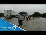 Habitantes de Michoacán toman precauciones ante la presencia de Raymond / Huracán Raymond