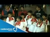 Niños triquis, campeones de basquetbol en Argentina, regresan a México
