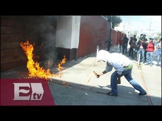 Descargar video: Caravana realiza actos vandálicos en Oaxaca en protesta por Ayotzinapa / Nacional