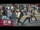 CNDH pide afinar protocolo de seguridad en marchas violentas / Titulares de la tarde