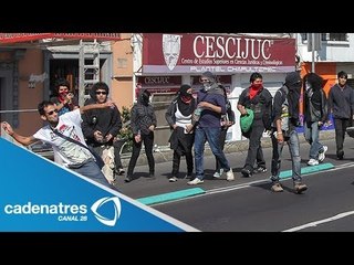 Encapuchados causan desmanes en marchas contra reforma energética; hay 14 detenidos