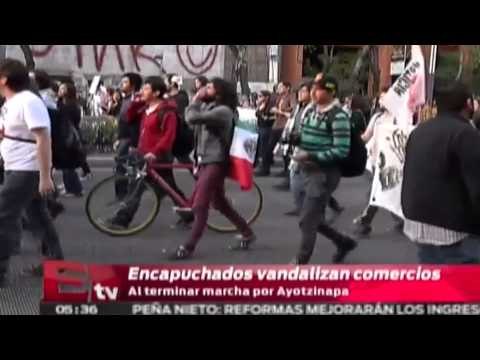 Marcha 1DMX: Encapuchados vandalizan comercios / Vianey Esquinca