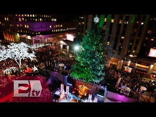 Entre protestas se ilumina el árbol navideño del Rockefeller/ Global