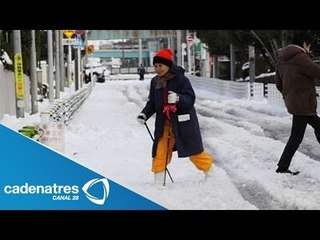 Tải video: Tokio vive la peor tormenta de nieve en 45 años (VIDEO)