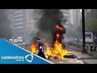 Venezuela: Opositores colocan barricadas en calles y crece a 13 el número de fallecidos