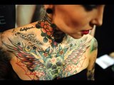 ¿Qué significan los tatuajes y piercings?