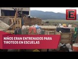 Niños rescatados de un campamento eran entrenados para perpetrar tiroteos en escuelas