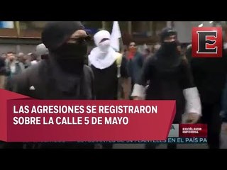 Encapuchados agreden a reportero y camarógrafo durante marcha del 2 de octubre