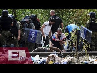 Download Video: Desesperado intento de migrantes por cruzar la frontera entre Grecia y Macedonia/ Excélsior