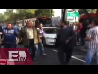 Gresca entre barzonistas y empleados de financiera en Insurgentes/ Vianey Esquinca