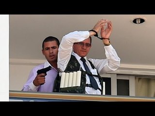 VIDEO: Terrorista con explosiovos toma de rehen a hombre y piden la renuncia de Dilma Rousseff