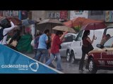 Lluvia y granizada sorprende a los capitalinos