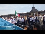 Caravana ciudadana llega al Zócalo y exige justicia en el caso Ayotzinapa