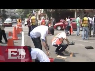 Voluntarios colocan señalamiento vial y peatonal en Colonia del Valle / Ricardo Salas