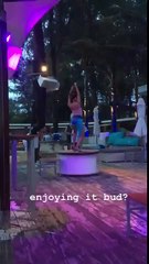 Kid laying down watching a dancer