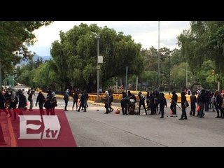 Encapuchados cierran Insurgentes Sur y vandalizan inmueble urbano/ Ingrid Barrera