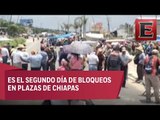 Integrantes de la CNTE bloquean plazas comerciales en Chiapas