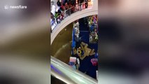 Shoppers flee in panic as mall floods following heavy rain