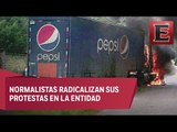 Queman vehículos en tramos carreteros de Michoacán
