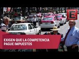 Taxistas se manifiestan en contra de Uber y Cabify