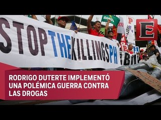 Скачать видео: Protestas en Filipinas en rechazo a la guerra antinarcotráfico