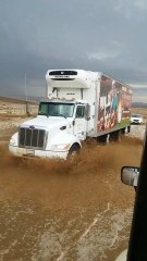 Flood Waters Spill Over onto California Highway