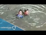 Rescatan a mujer atrapada por las intensas lluvias en Periférico