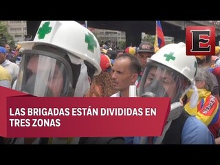 Voluntarios venezolanos apoyan a heridos en protestas