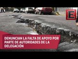 Angustia a vecinos de Tláhuac la formación de grietas en las calles