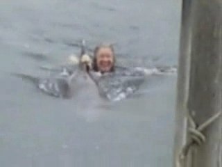 Barbara & Carrie Gilmour swim with the Dolphins