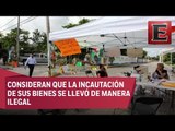 Dueños de cajas de seguridad incautadas retiran bloqueos en Cancún