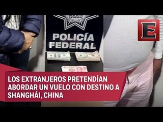 Detienen a dos peruanos en el AICM con 700 mil pesos sin declarar