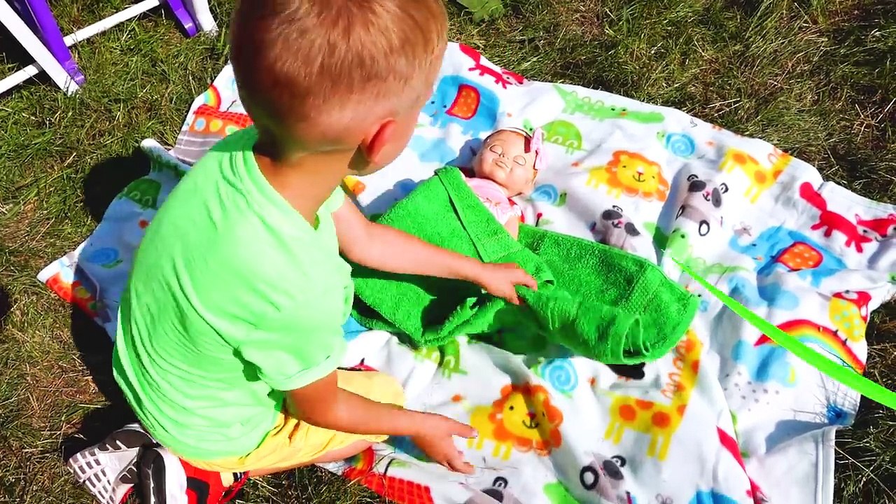 Vlad and Nikita Pretend play with Dolls on Outdoor playground