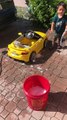 Cute Kid Washes Toy Car