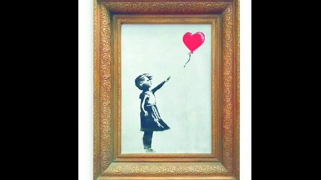 Banksy painting 'self-destructs' in artist's prank at auction