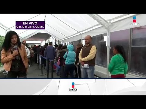 Damnificados hacen fila de 12 horas para recibir ayuda | Noticias con Yuriria Sierra